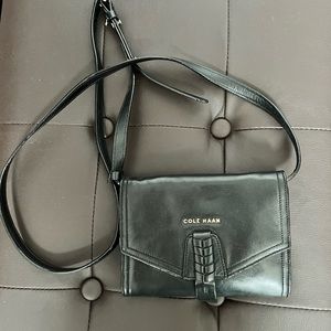 Come Haan black leather crossbody which doubles as a cute little clutch